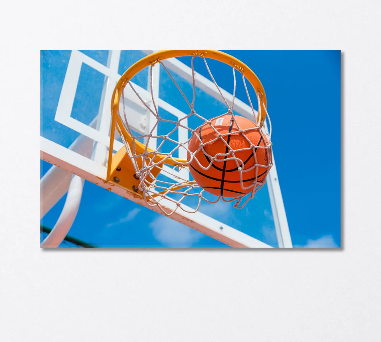 Basketball swish in bright sky — canvas wall art